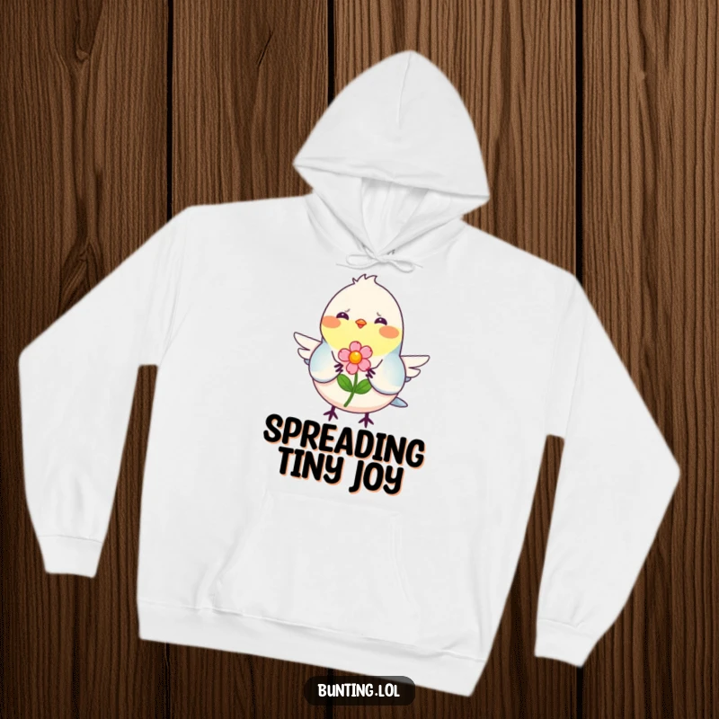 Funny Hoodie featuring a smiling bunting bird offering a flower, perfect for cozy moments of kindness and warmth.