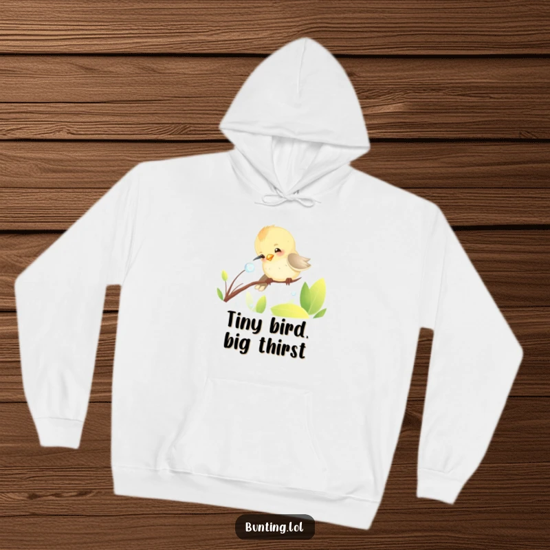 Funny Hoodie showcasing a cute bunting bird's funny antics, playfully pecking at a glistening dewdrop, perfect for cozy laughs.