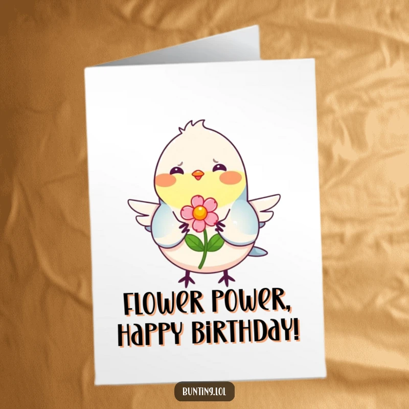 Free Printable Birthday Card: A smiling bunting bird happily offering a tiny, colorful flower, wishing you the happiest birthday.