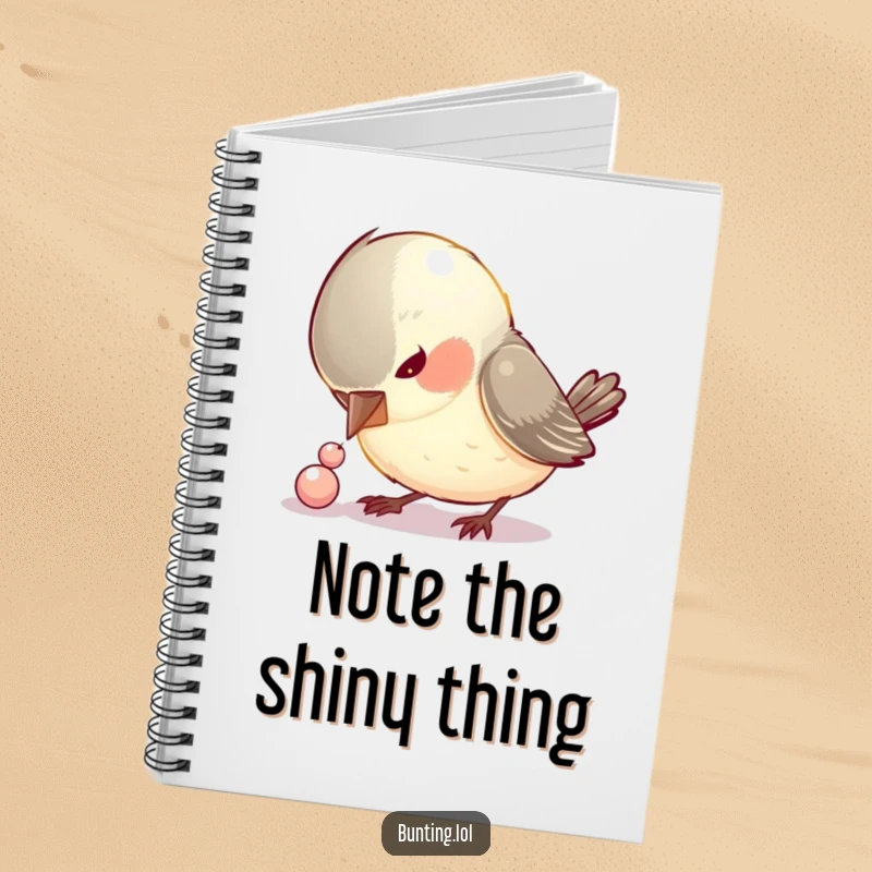 Funny notebook featuring a curious bird pecking at a small, shiny bead, inspiring focused note-taking with humor.